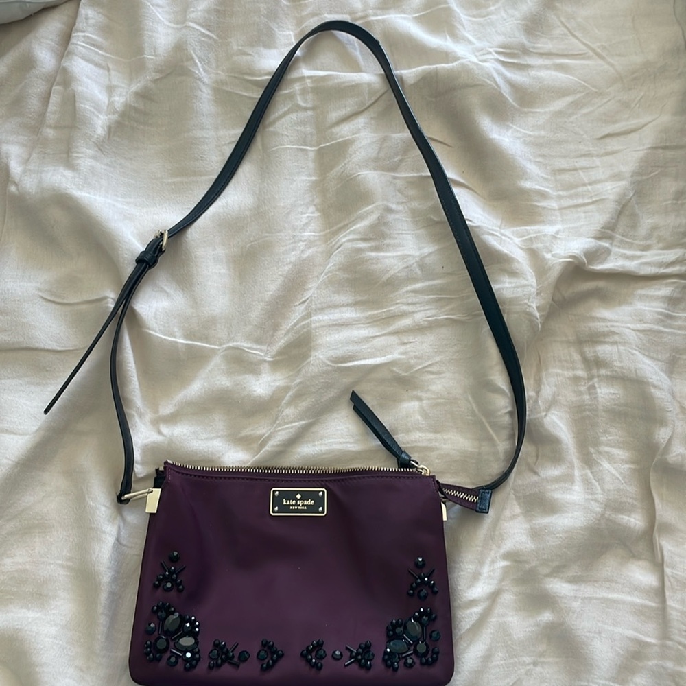 Gently used waterproof Kate Spade crossbody with 3 compartments